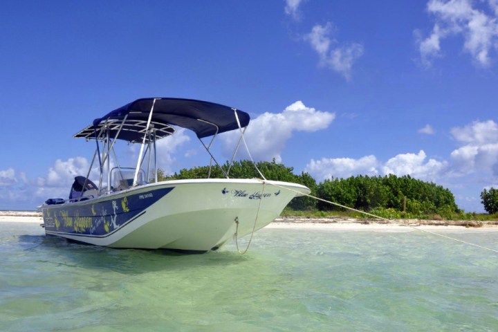 a small boat in a body of water